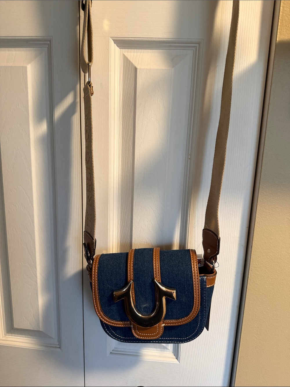 True Religion Denim Crossbody with Tan Trim and Signature U Accent